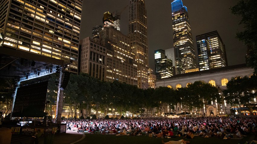 NEW YORK, NY – JUNE 24: People watch an outdoor movie on the lawn of Bryant Park in the nighttime on June 24, 2024 in New York City. (Photo by Liao Pan/China News Service/VCG via Getty Images)
