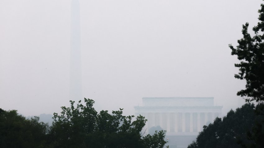 WASHINGTON, DC – JULY 17: Smoke from massive wildfires in Canada and Minnesota engulf the Washington, D.C. skyline, reducing visibility and casting a colored haze over the Washington Monument and Lincoln Memorial on July 17, 2026 in Washington, D.C. Authorities are continuing to monitor for unsafe conditions as air quality alerts are in effect across a vast portion of the United States. (Photo by Finn Gomez/Getty Images)