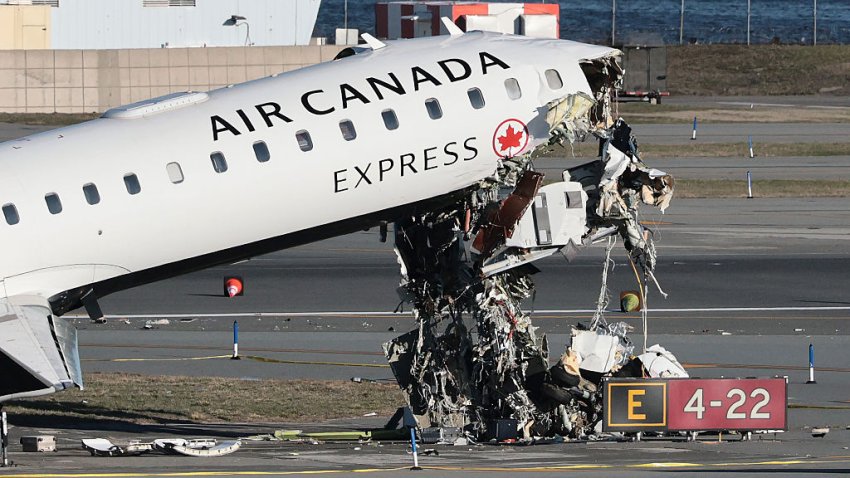 NEW YORK, NEW YORK – MARCH 24: An Air Canada Express CRJ-900 sits on the runway after colliding with a Port Authority fire truck at LaGuardia Airport on March 24, 2026 in New York City. Flights into and out of LaGuardia airport have resumed after an Air Canada Express plane flight from Montreal collided with a fire truck on the tarmac killing the pilot as well as the co-pilot and leaving more than forty people injured.   (Photo by Michael M. Santiago/Getty Images)